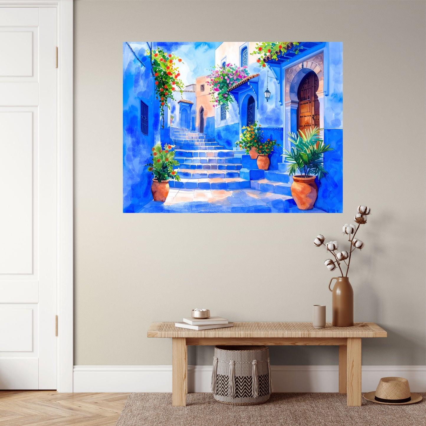 Colorful painting of a Mediterranean street with plants on a wall above a wooden bench.