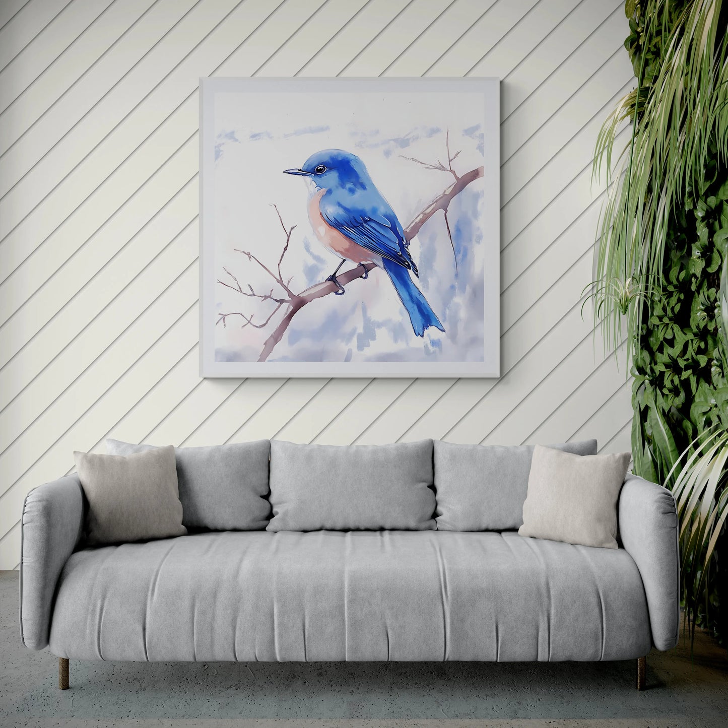 Gray sofa with a painting of a blue bird on a white wall.