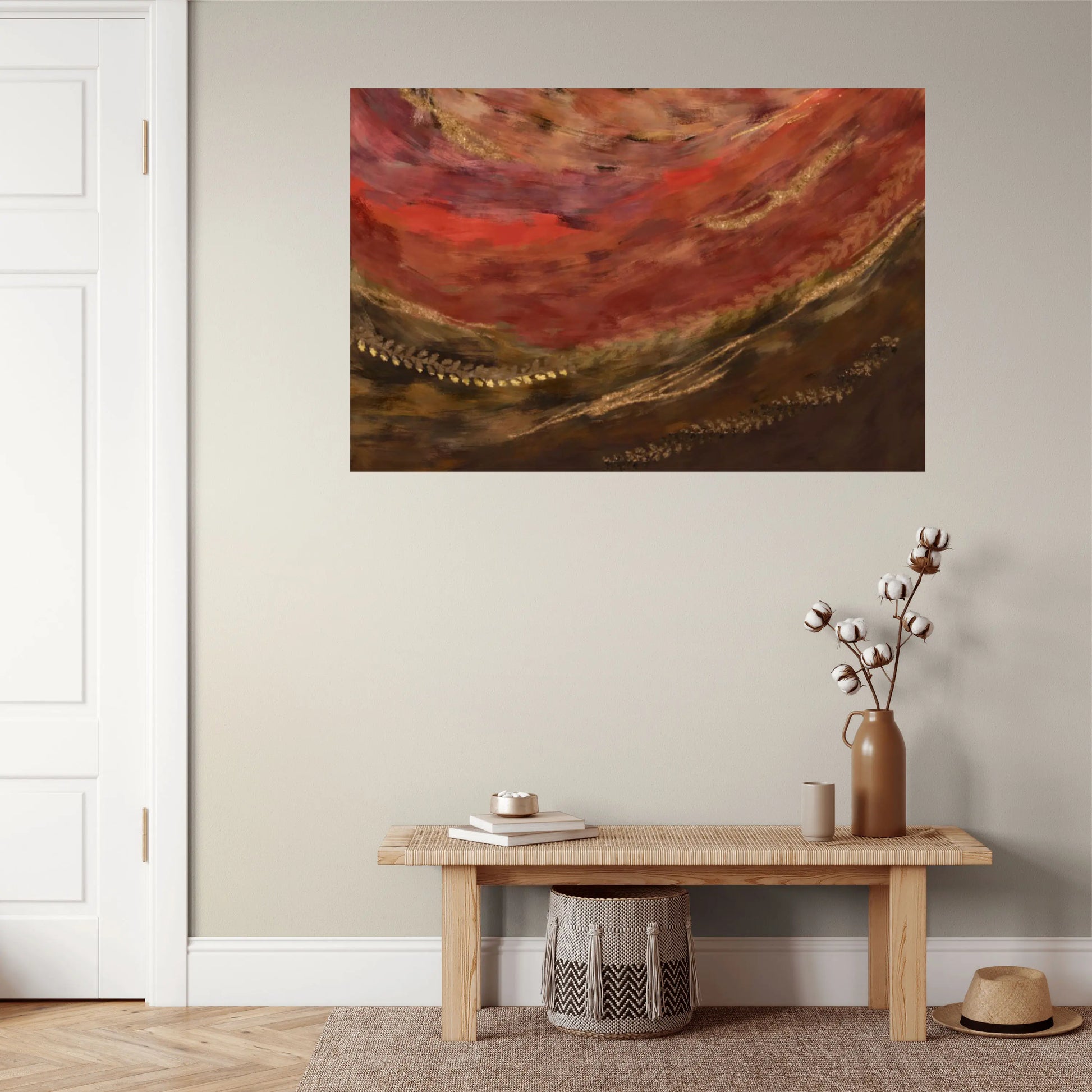 Abstract painting on a wall above a wooden bench with decorative items.