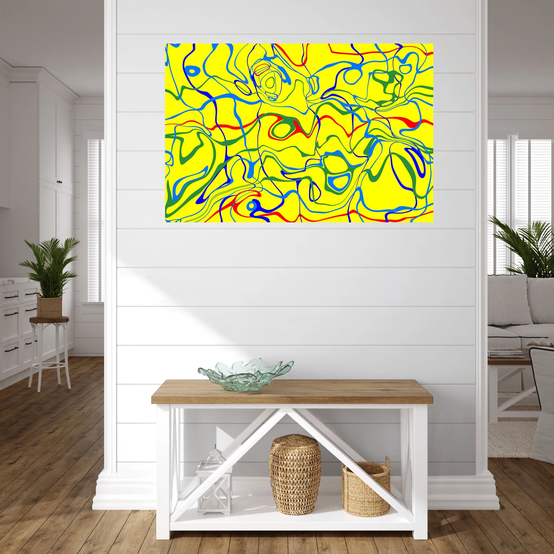 Colorful abstract painting on a white wall above a wooden bench with decorative items.