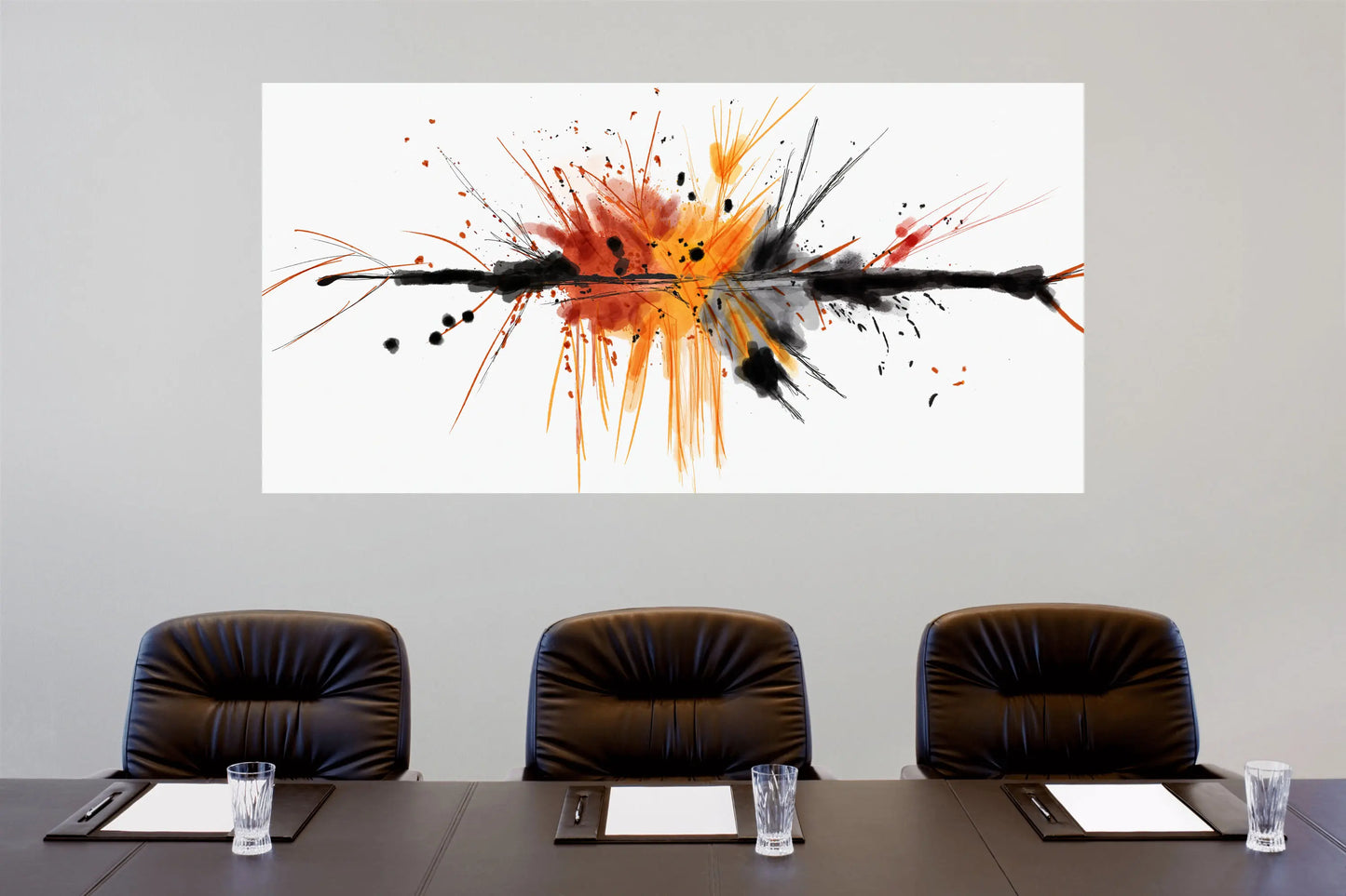 Abstract art piece on a wall above a conference table with chairs.