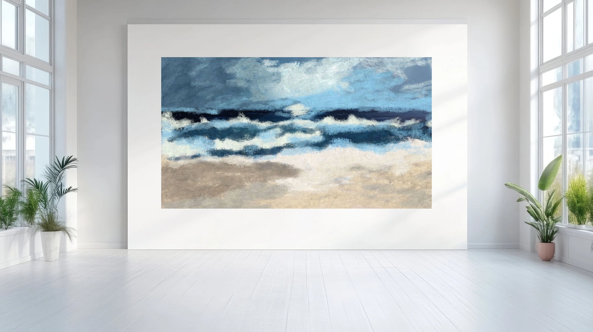 Framed artwork of a beach scene with waves on a white wall.