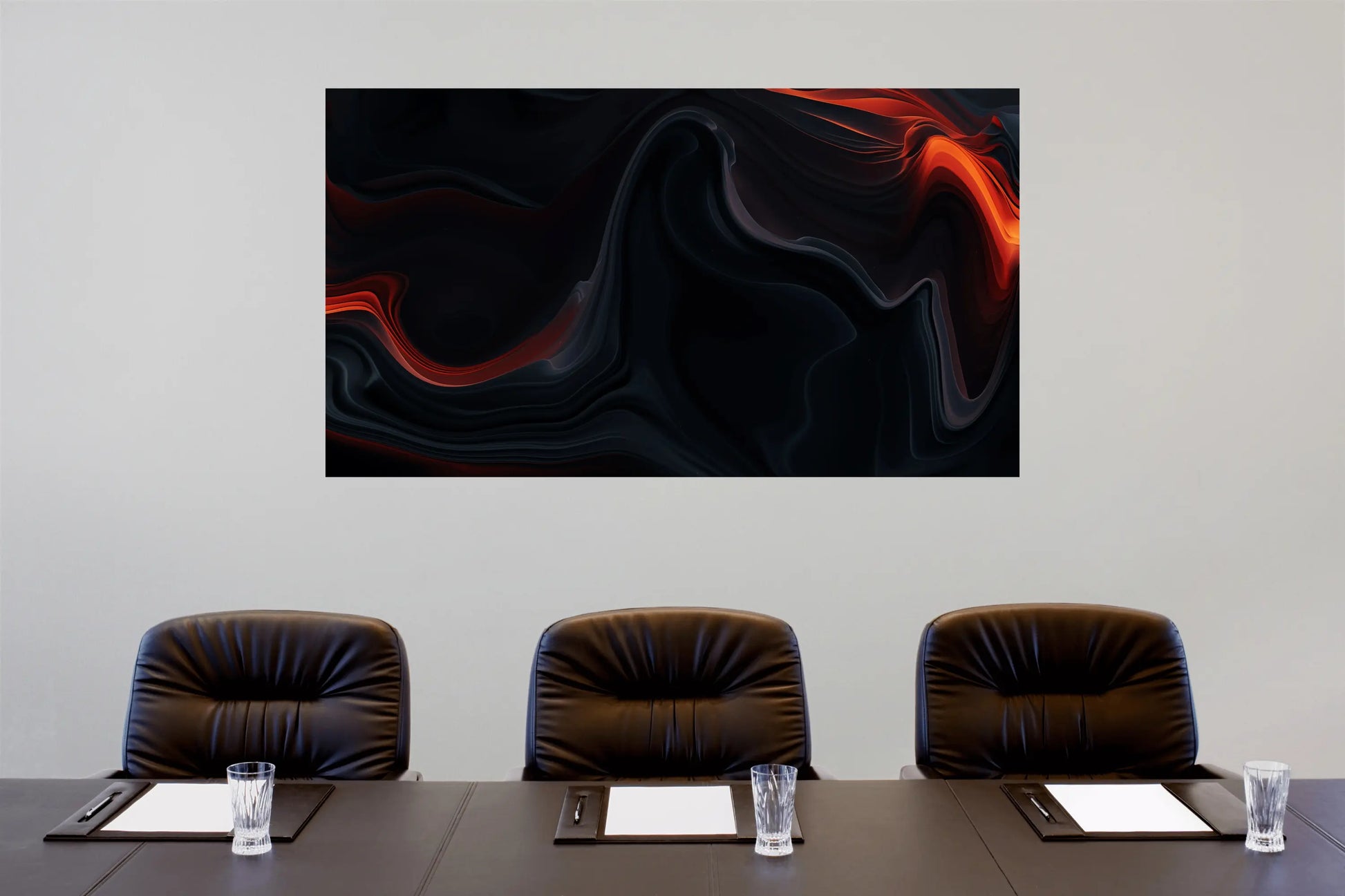 Boardroom with three chairs and a large abstract painting on the wall.
