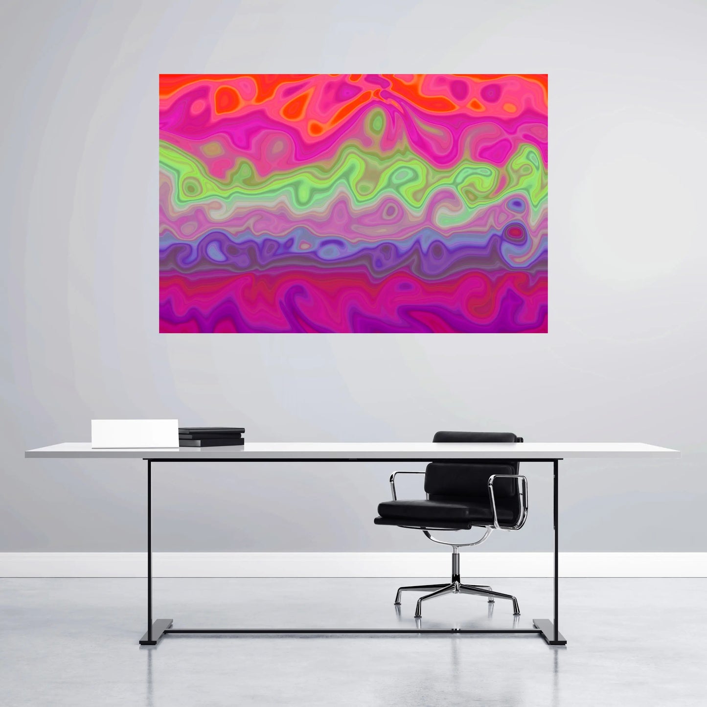 Modern office setup with a colorful abstract painting on the wall.