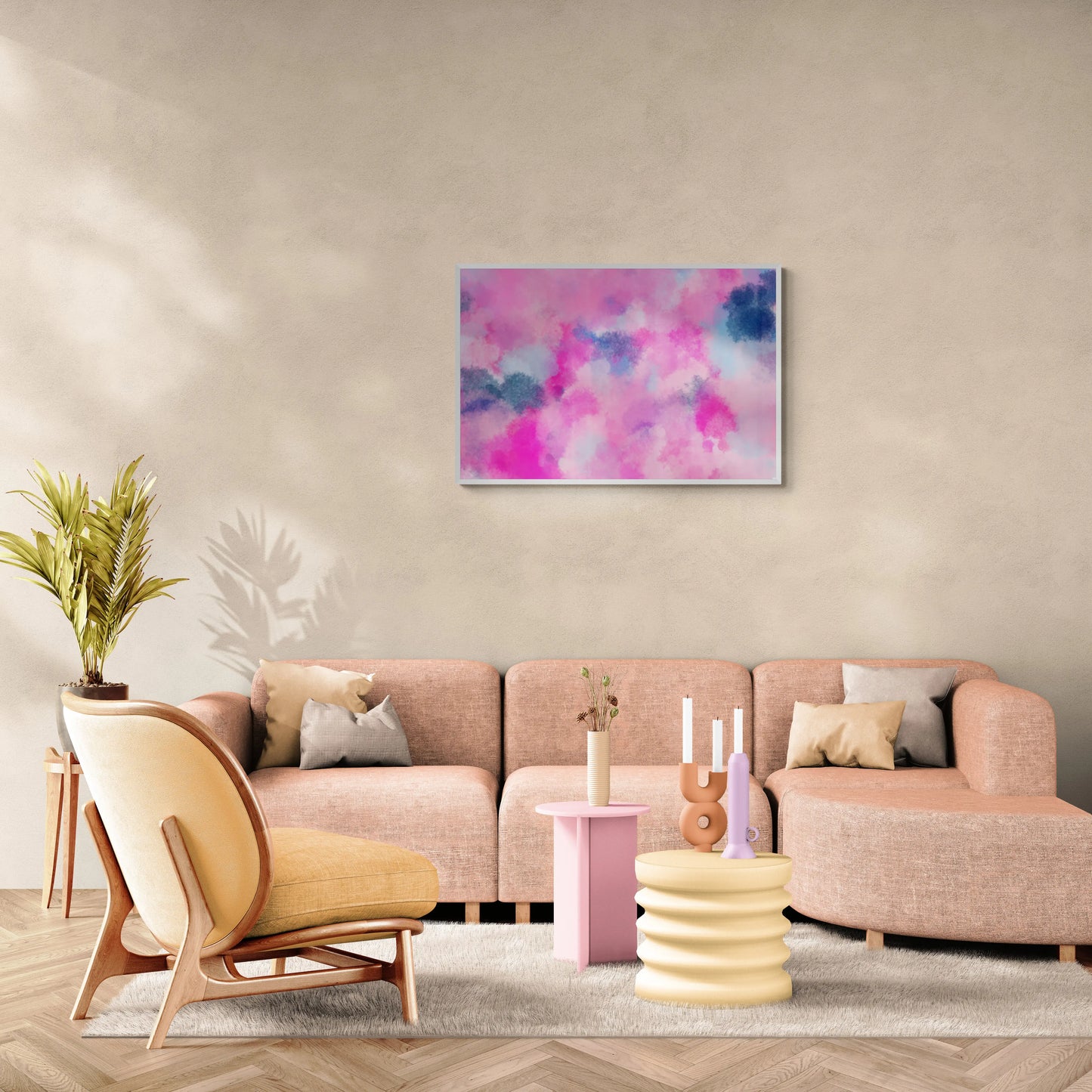 Living room with a pink sofa, yellow armchair, and abstract art on the wall.