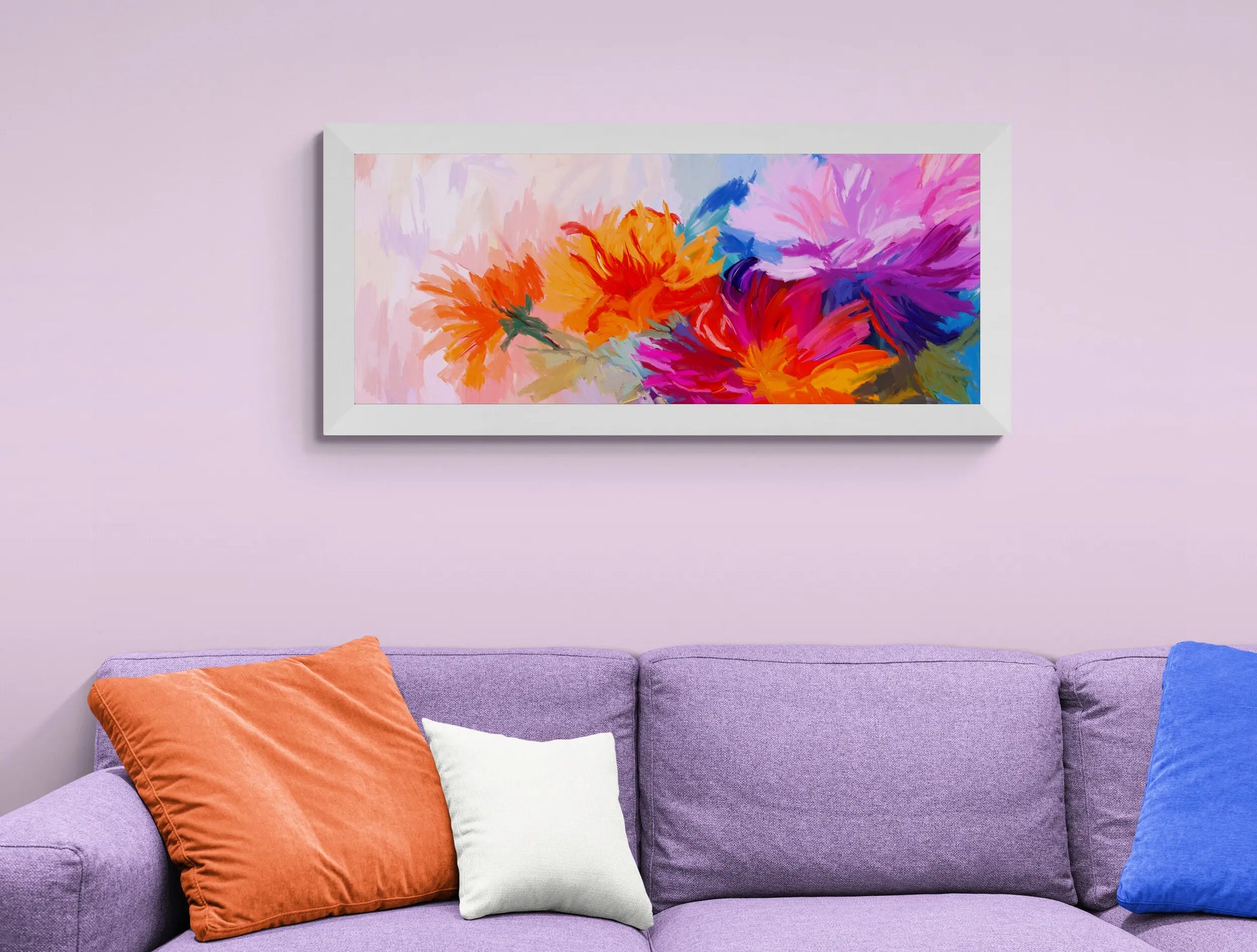 Colorful floral painting on a wall above a purple sofa with colorful cushions.
