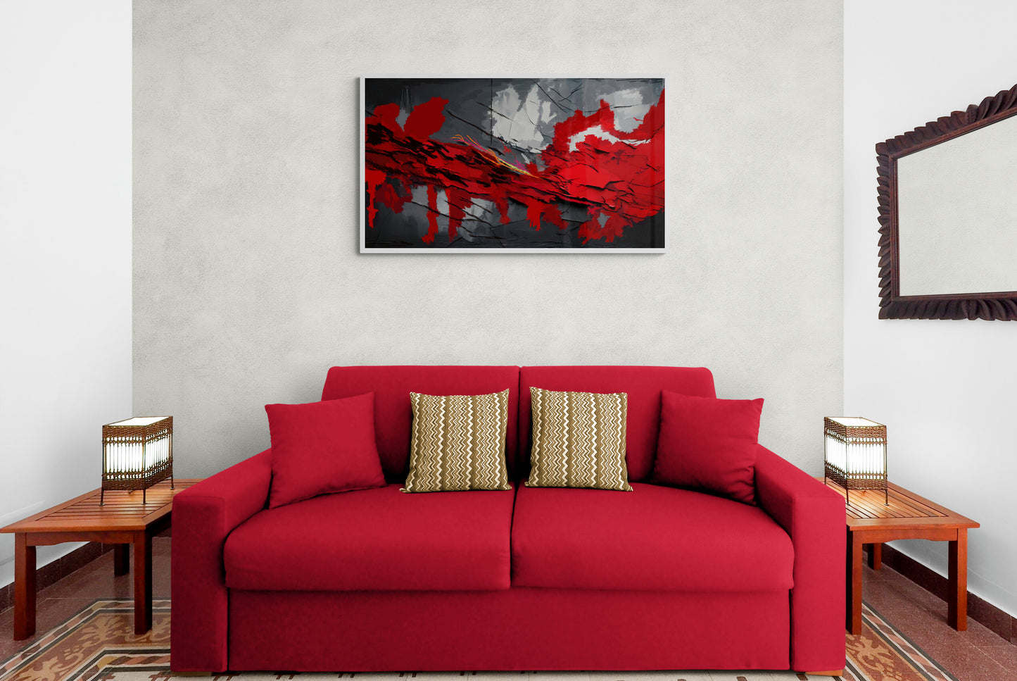 Red sofa with gold pillows in a living room setting with abstract art on the wall.