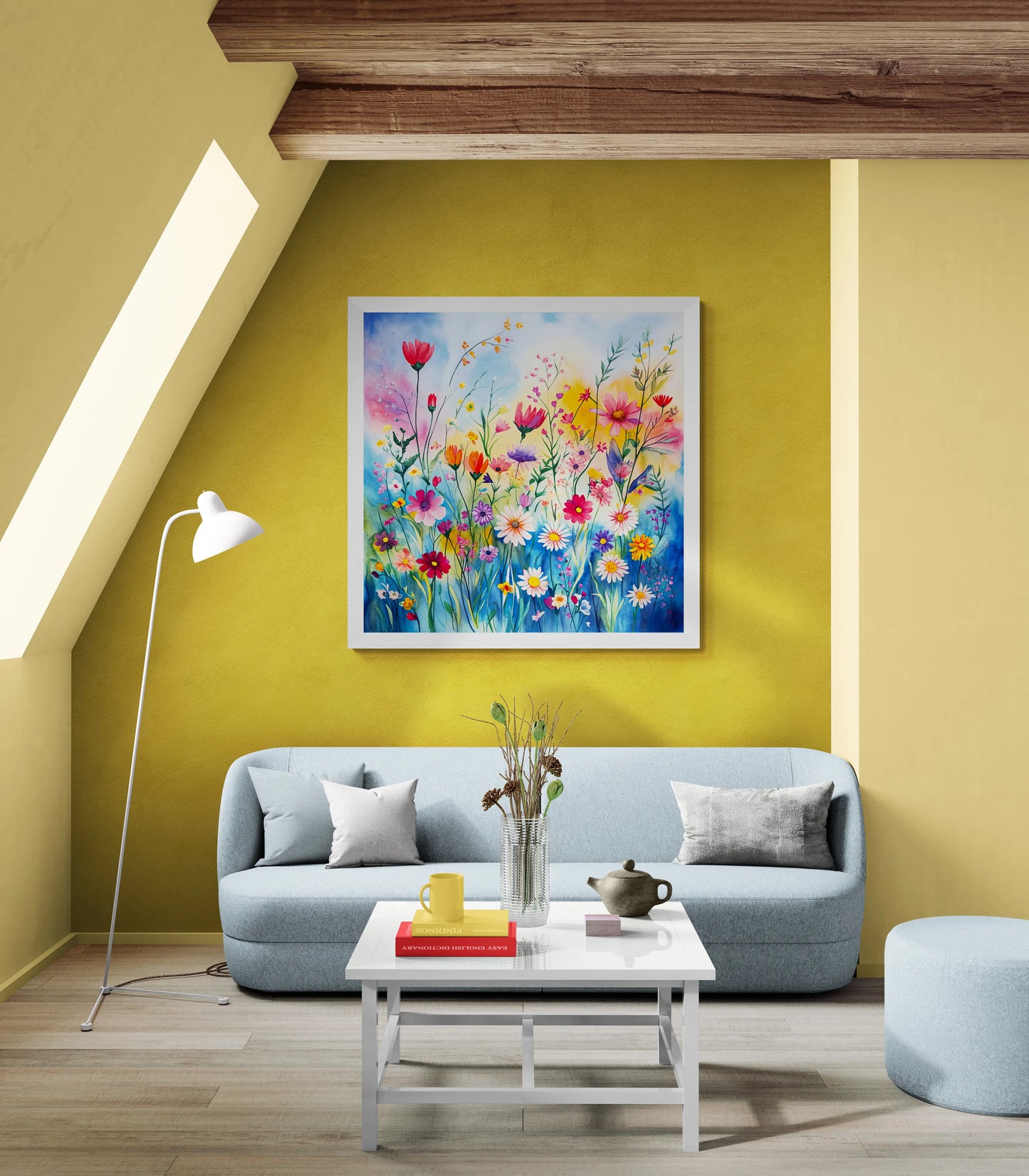 Living room with a colorful floral painting on a yellow wall, gray sofa, and white coffee table.