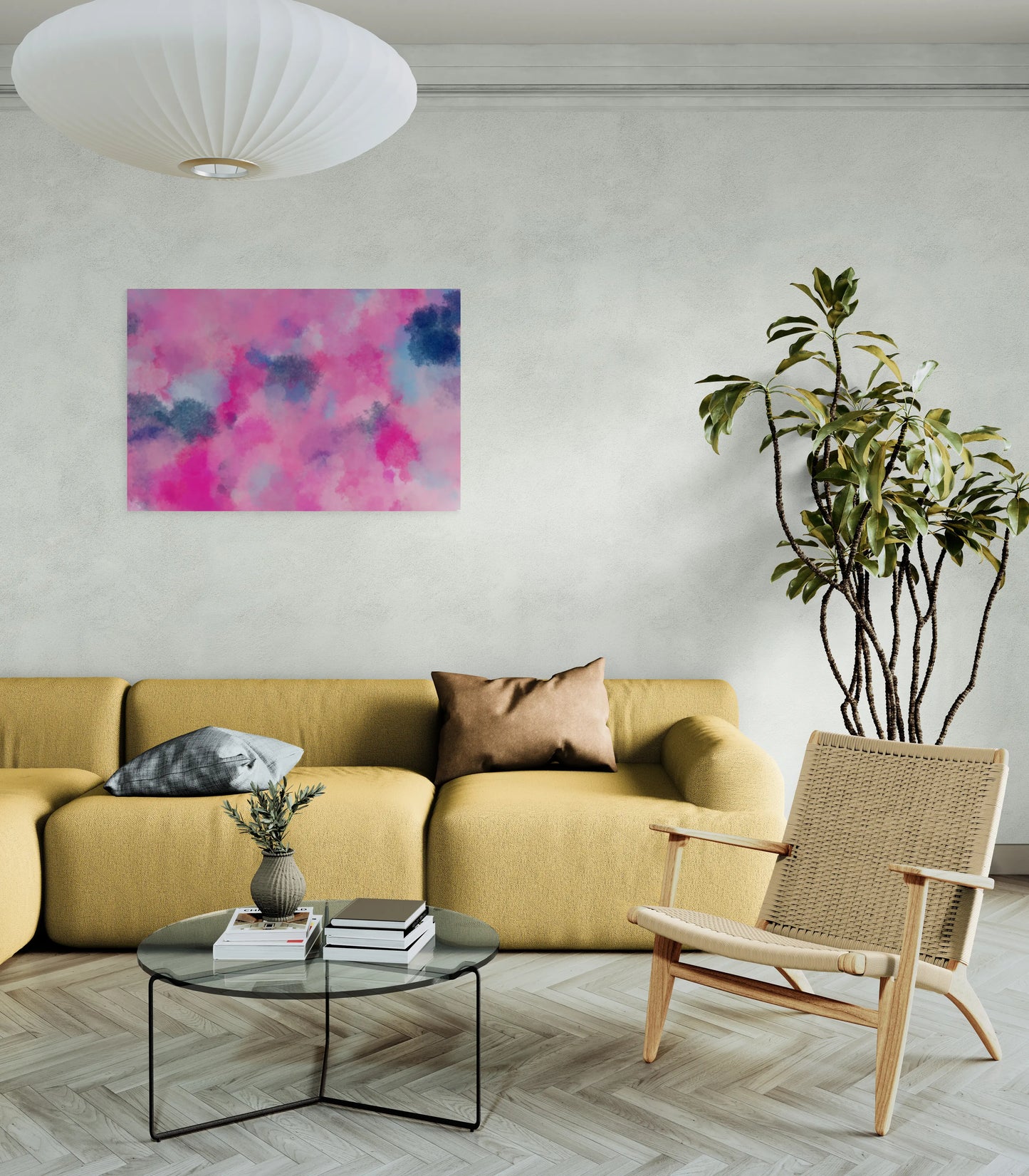 Modern living room with yellow sofa, wicker chair, and abstract painting on wall.