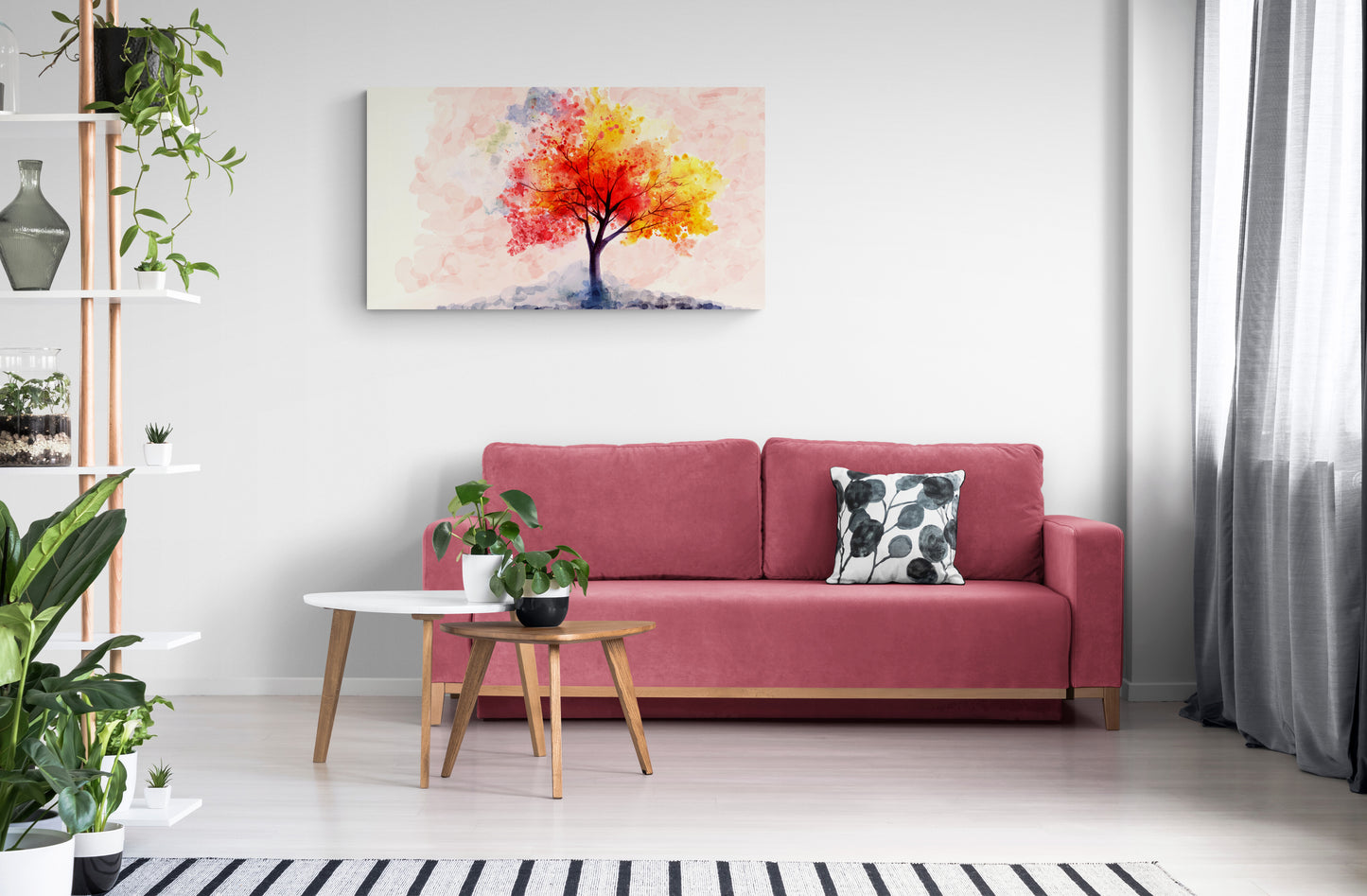 Modern living room with a red sofa, coffee table, and decorative wall art.