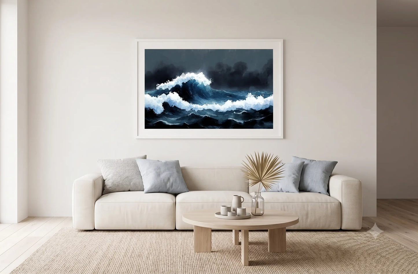 A framed square art print depicting a dramatic dark blue and white ocean wave, displayed on a beige wall above a modern white sofa in a minimalist living room.